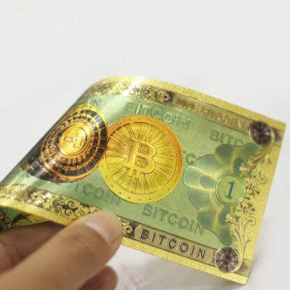 gold plated 1 bitcoin banknote souvenir money closeup view